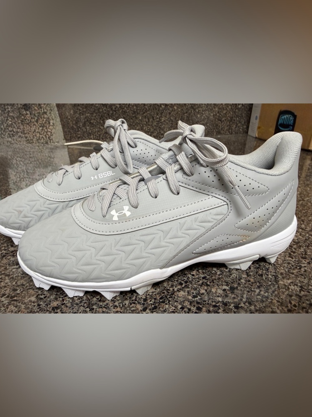 Under Armour youth gray BSBL baseball cleats